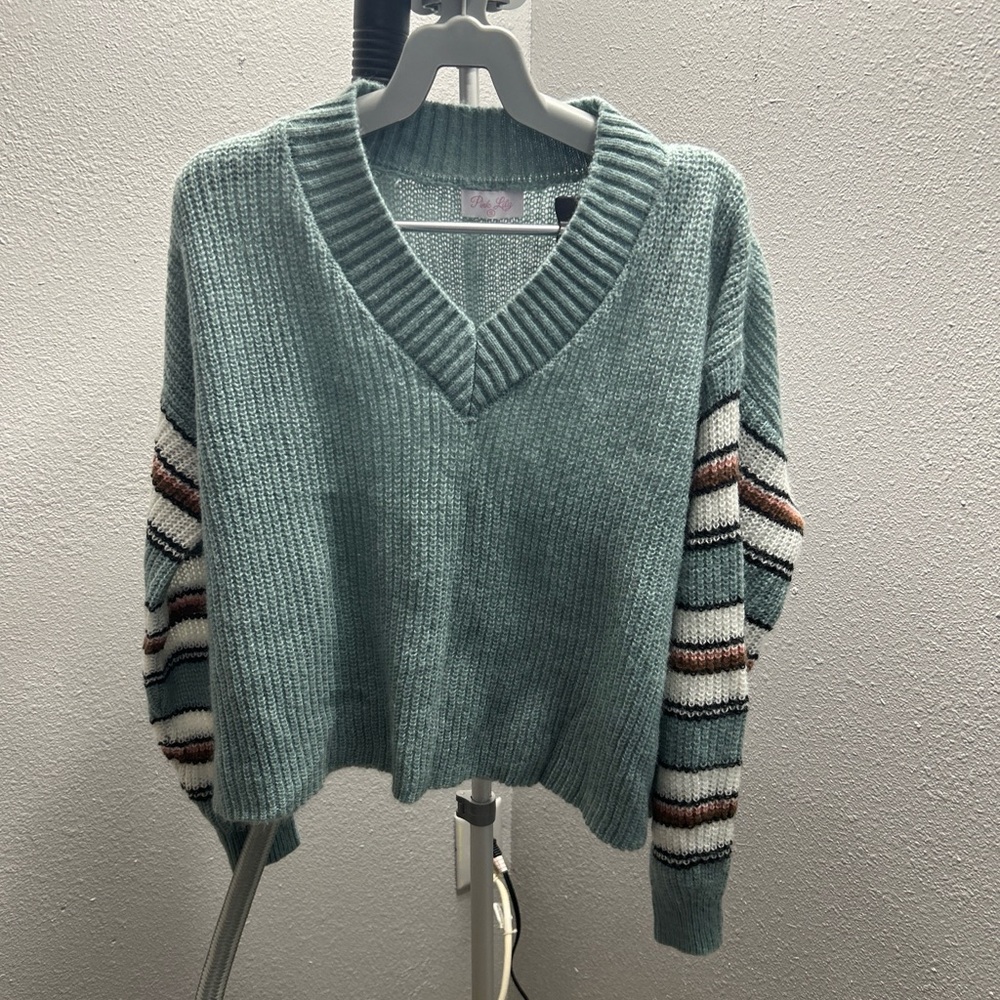 Pink lily oversized cropped long sleeve size small woman’s sweater.